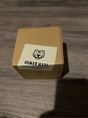 Human Made Box with Black Logo on Tan Sticker